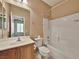 Clean bathroom with vanity, sink, and a shower-tub combo, providing functionality and convenience at 8267 Campbell Springs Ave, Las Vegas, NV 89178