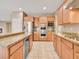 Modern kitchen with stainless steel appliances and ample counter space at 8267 Campbell Springs Ave, Las Vegas, NV 89178