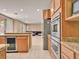 Modern kitchen with stainless steel appliances at 8267 Campbell Springs Ave, Las Vegas, NV 89178