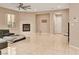 Spacious living room with fireplace and tile flooring at 8267 Campbell Springs Ave, Las Vegas, NV 89178