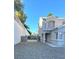 Charming home showcasing a well-maintained exterior with a front yard at 8328 Cimarron Ridge Dr, Las Vegas, NV 89128