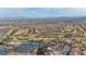 Aerial view of the golf course, tennis courts, and community pool at 8904 Evening Star Dr, Las Vegas, NV 89134