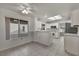 Bright kitchen with white cabinetry, tile flooring, and lots of sunlight at 8904 Evening Star Dr, Las Vegas, NV 89134