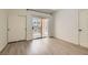 Bedroom featuring a sliding door to the patio, a large closet, and white walls at 900 Heavenly Hills Ct # 112, Las Vegas, NV 89145