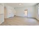 Spacious living room featuring modern flooring, an open floor plan, and natural light at 900 Heavenly Hills Ct # 112, Las Vegas, NV 89145