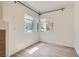 Bright living room featuring modern flooring, and bright windows at 900 Heavenly Hills Ct # 112, Las Vegas, NV 89145