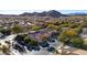 Wide aerial view of a desert community with mountain views, showcasing the property's prime location at 9077 Creed Mountain Pl, Las Vegas, NV 89178