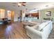 Bright, open-concept living area flowing into the dining and kitchen spaces at 9077 Creed Mountain Pl, Las Vegas, NV 89178
