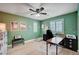 Bright office space with hardwood floors, a ceiling fan, and a large window for natural light at 917 Pomander Point Pl, Henderson, NV 89012