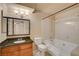 Bathroom with a large soaking tub and granite vanity at 9325 W Desert Inn Rd # 143, Las Vegas, NV 89117