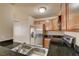 Modern kitchen featuring granite counters and stainless steel appliances for a stylish look at 9325 W Desert Inn Rd # 143, Las Vegas, NV 89117
