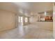 Spacious living room featuring neutral colors, tiled floors and a window seat at 9325 W Desert Inn Rd # 143, Las Vegas, NV 89117