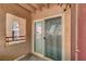 Enclosed patio with access to property through sliding glass door and railing views at 9325 W Desert Inn Rd # 143, Las Vegas, NV 89117