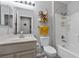 Bright bathroom featuring a tub-shower combination and a modern vanity with light grey cabinets at 9445 Grand Mesa Dr, Las Vegas, NV 89134