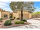 Well-maintained home with mature landscaping and a spacious driveway leading to a two-car garage at 9445 Grand Mesa Dr, Las Vegas, NV 89134