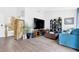 Bright living room featuring modern decor, wood floors and comfortable seating at 9445 Grand Mesa Dr, Las Vegas, NV 89134