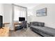 Inviting home office space with a desk, shelving, and comfortable seating at 9445 Grand Mesa Dr, Las Vegas, NV 89134
