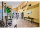 Grand entryway features high ceilings, chandelier, tile flooring, and artistic decor, creating a welcoming atmosphere at 9921 Heffner Hills Cir, Las Vegas, NV 89117