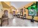 Inviting entryway boasts high ceilings, a decorative chandelier, stylish decor, and a large window with natural light at 9921 Heffner Hills Cir, Las Vegas, NV 89117