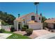 Charming two-story home with a tile roof, well-manicured landscaping, and attached two car garage at 9921 Heffner Hills Cir, Las Vegas, NV 89117
