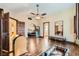 Spacious main bedroom showcases hardwood floors, ceiling fan, and arched doorways leading to other rooms at 9921 Heffner Hills Cir, Las Vegas, NV 89117