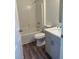 Modern bathroom features a white vanity, sleek fixtures, and shower-tub combination at 1040 Karen Ct, Pahrump, NV 89048