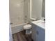Clean bathroom with modern tub/shower combination, sink, and vanity at 1040 Karen Ct, Pahrump, NV 89048