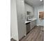 Well-lit kitchen featuring modern cabinets, stainless steel appliances, and stylish fixtures at 1040 Karen Ct, Pahrump, NV 89048