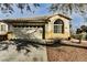 Charming home featuring a two-car garage and low-maintenance desert landscaping at 10404 Shadowland Ave, Las Vegas, NV 89144