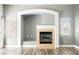 Living room fireplace with white trim and mantle detail and tiled hearth at 10404 Shadowland Ave, Las Vegas, NV 89144