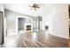 Bright living room with wood floors, fireplace and recessed lighting features at 10404 Shadowland Ave, Las Vegas, NV 89144