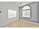 Neutral room featuring tile flooring, neutral colors, and bright window at 10404 Shadowland Ave, Las Vegas, NV 89144