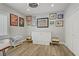 Cozy bedroom with hardwood floors, murphy bed, and closet at 11249 Revelry Ln, Las Vegas, NV 89138