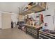 Well-organized garage area with shelving, workbench, and storage solutions at 11249 Revelry Ln, Las Vegas, NV 89138