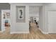 Hallway leads to multiple rooms, showcasing the home's open layout at 11249 Revelry Ln, Las Vegas, NV 89138