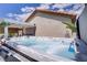Inviting hot tub with multiple jets and pergola in a private backyard setting at 11249 Revelry Ln, Las Vegas, NV 89138