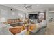 Cozy living room with comfortable seating, stylish decor, and ample natural light at 11249 Revelry Ln, Las Vegas, NV 89138