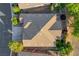 An aerial view captures the home's roof, lush backyard, and the surrounding neighborhood layout at 1153 Mesa Verde Run, Mesquite, NV 89027