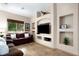 Comfortable living room with built-in shelving and entertainment center at 1153 Mesa Verde Run, Mesquite, NV 89027