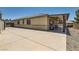 Large backyard with a covered patio and desert landscaping at 1197 Bear Head St, Henderson, NV 89011