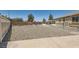 Spacious backyard featuring partial rock landscaping and an outdoor spa at 1197 Bear Head St, Henderson, NV 89011