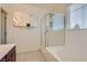 Bright bathroom featuring a glass shower and tile floors at 1197 Bear Head St, Henderson, NV 89011