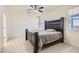Bedroom featuring tile flooring, windows, and ceiling fan at 1197 Bear Head St, Henderson, NV 89011