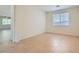 Bright and airy bedroom featuring a tile floor and large window, creating a welcoming atmosphere at 1197 Bear Head St, Henderson, NV 89011