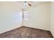 Cozy bedroom with neutral carpet and ample natural light from a window at 1197 Bear Head St, Henderson, NV 89011