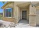 Close up of the front door and tiled entry way, and the home address number at 1197 Bear Head St, Henderson, NV 89011