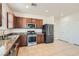 A lovely kitchen featuring stainless steel appliances and granite countertops at 1197 Bear Head St, Henderson, NV 89011