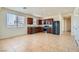Spacious kitchen features stainless steel appliances and ceramic tile flooring at 1197 Bear Head St, Henderson, NV 89011