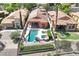 Aerial view of home featuring pool and landscaped backyard; a perfect outdoor oasis and place to relax at 12 Via Ravello, Henderson, NV 89011