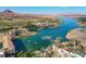 Stunning aerial view of a waterfront community featuring calm waters, boats, and lakeside residences at 12 Via Ravello, Henderson, NV 89011